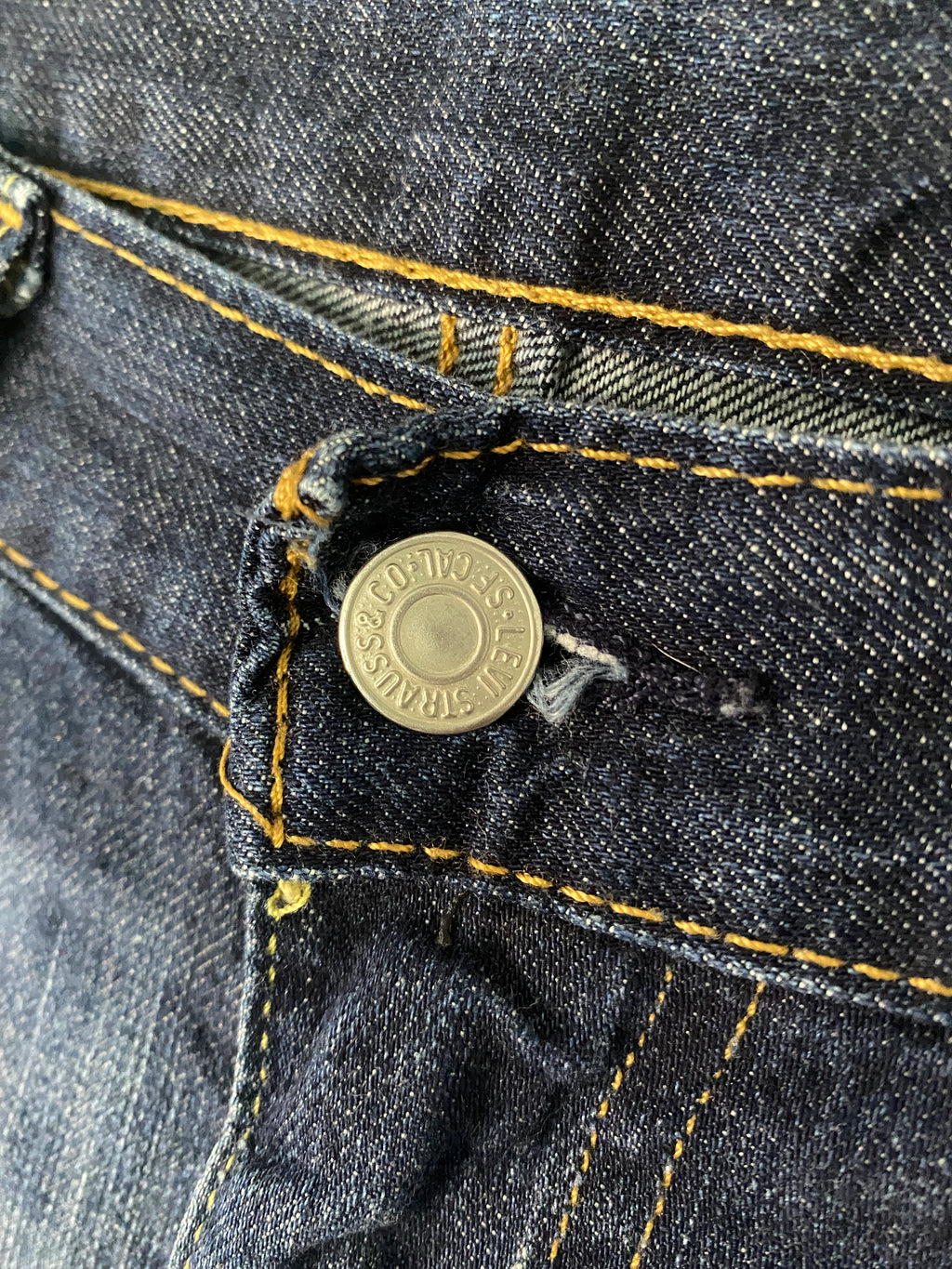 Jean Levi's 514 vintage seconde main W34L32 – détail bouton braguette