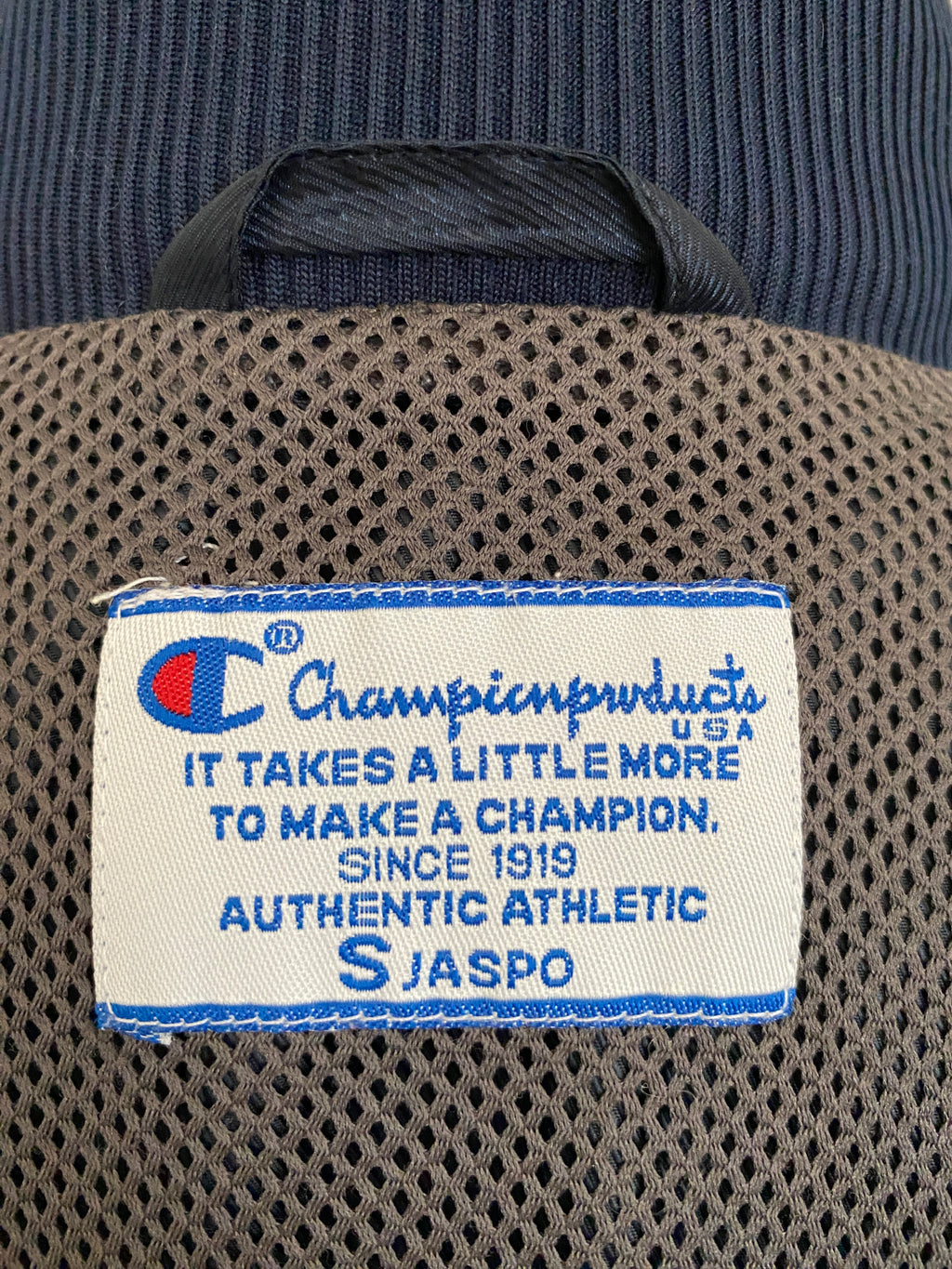Veste Champion Products USA Vintage 90's – détail étiquette marque, logo, matière technique – S JASPO – seconde main