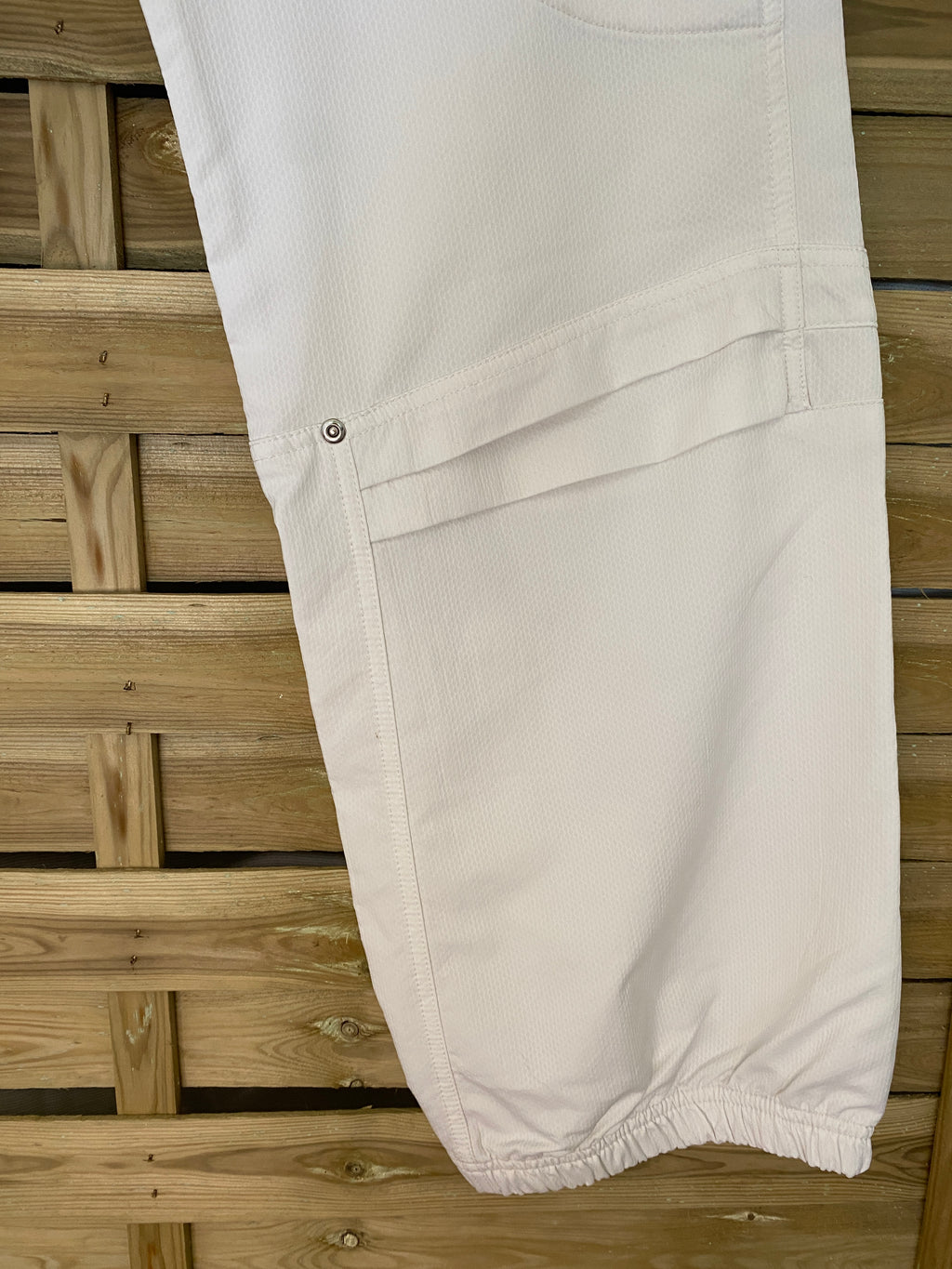 Pantalon Nike Sphere Dry – détail plissage genoux et cheville élastiquée