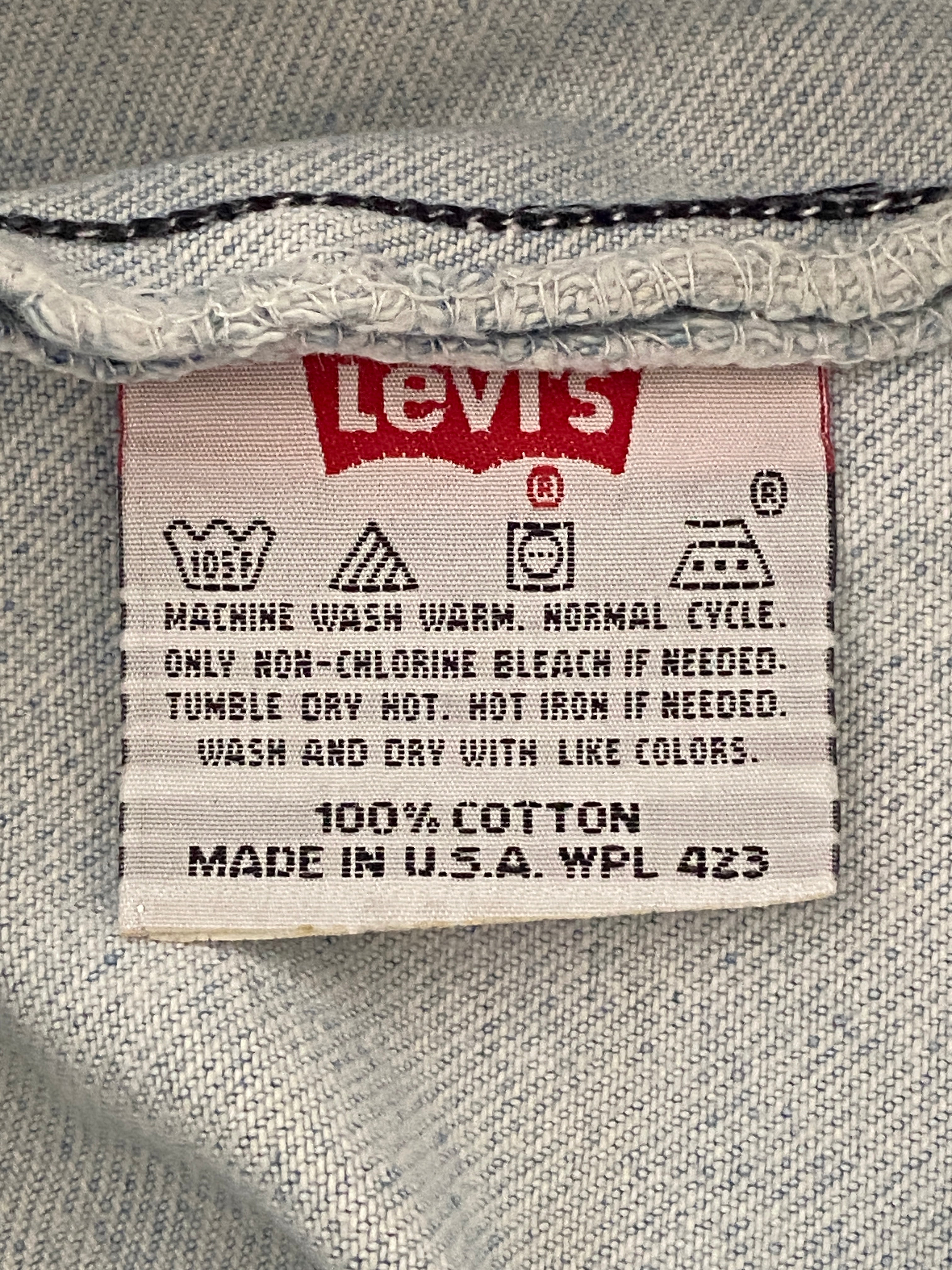 Levi's 501 – détail étiquette intérieure tissu Levi's, instructions d'entretien, 100% Cotton Made in U.S.A.
