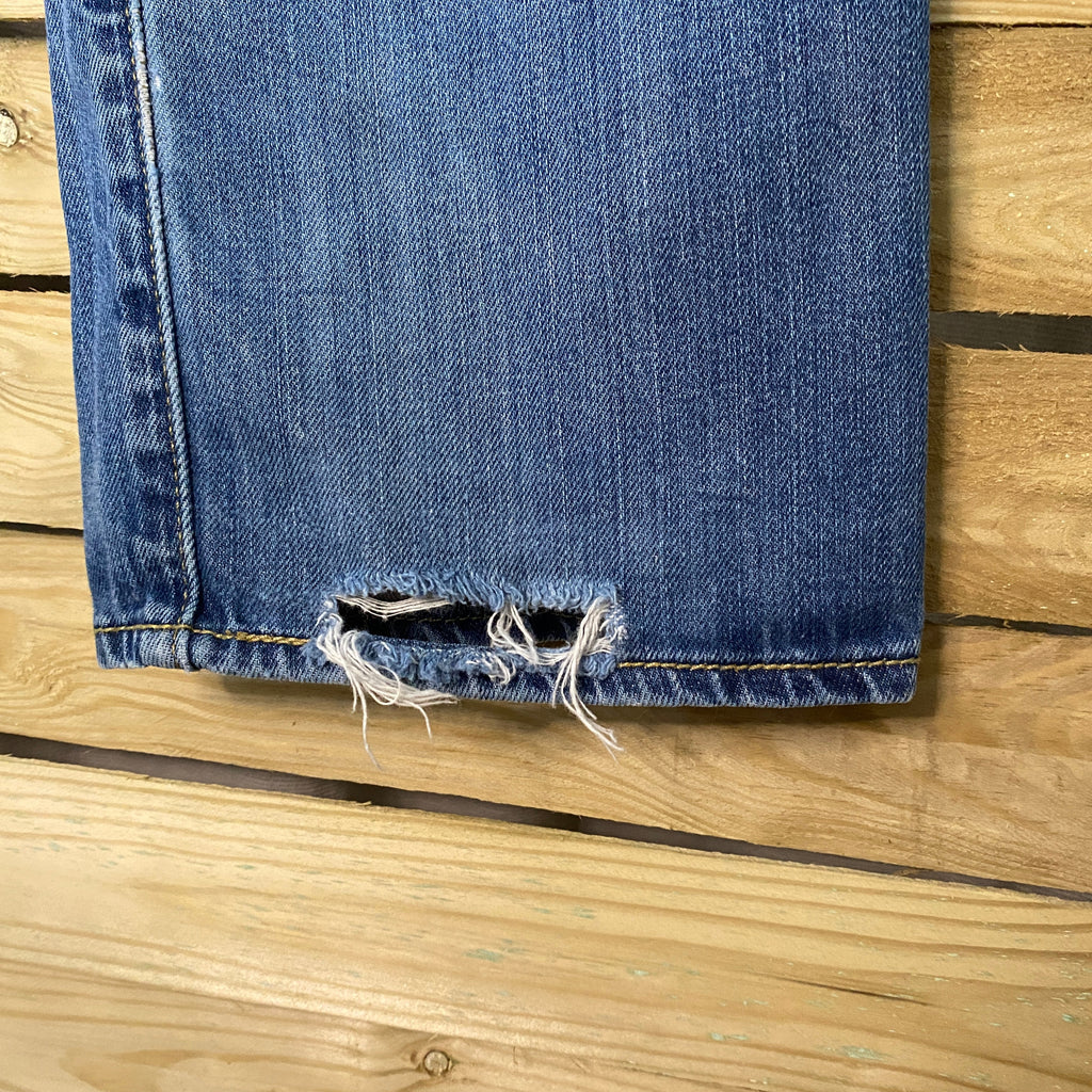 Levi's 501 – détail bas de jambe gauche, accroc effilochage visible, usure authentique used