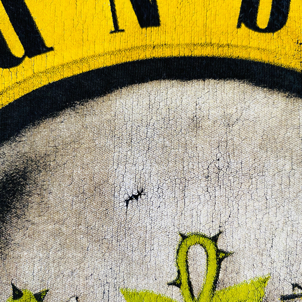 Gros plan trou sur le flocage – défaut visible sur le bullet circle Guns N' Roses
