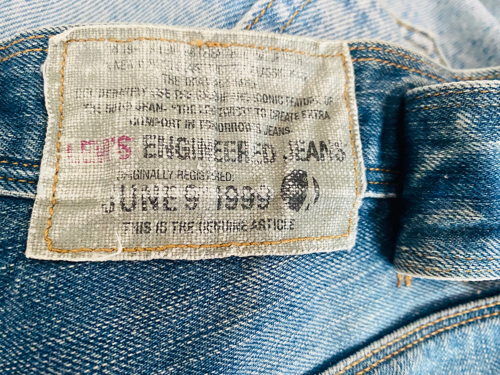 Détail étiquette ceinture extérieure