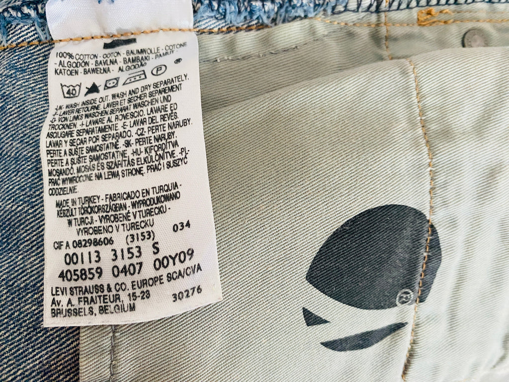 Détail étiquette intérieure – taille, modèle, matière