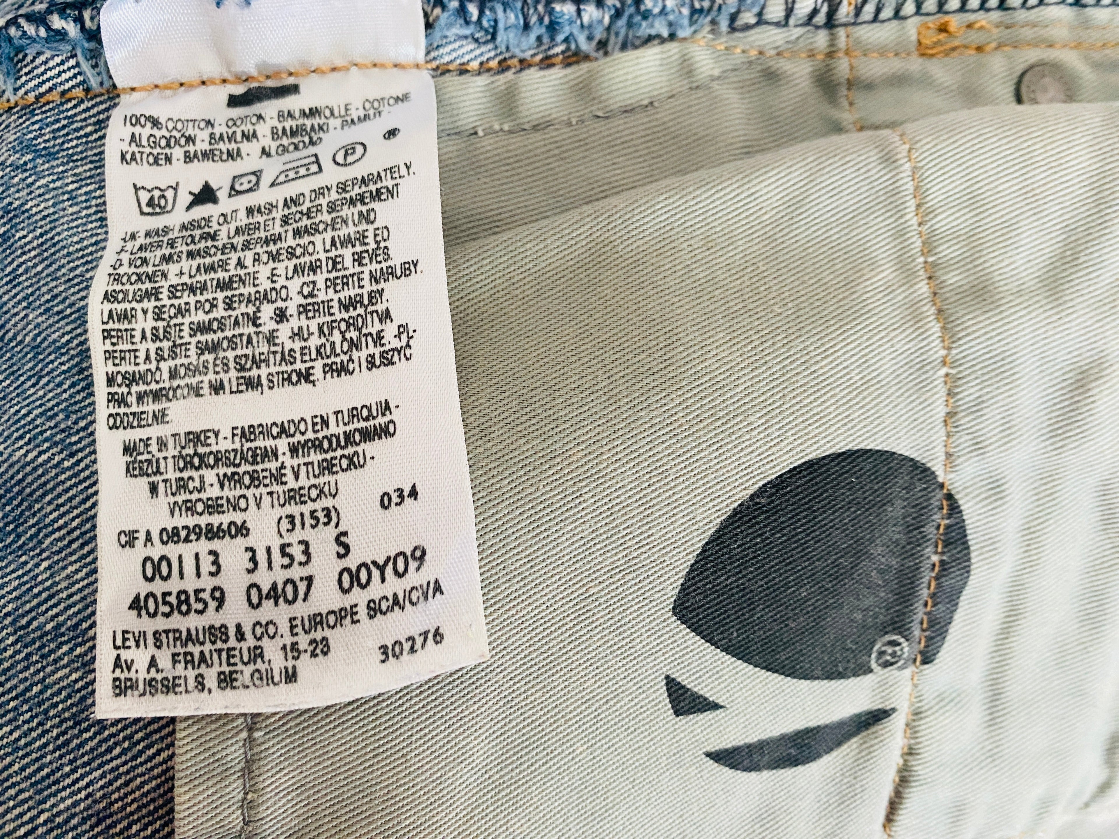Détail étiquette intérieure – taille, modèle, matière