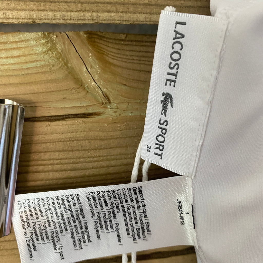 Détail étiquettes d'origine et marque Lacoste Sport