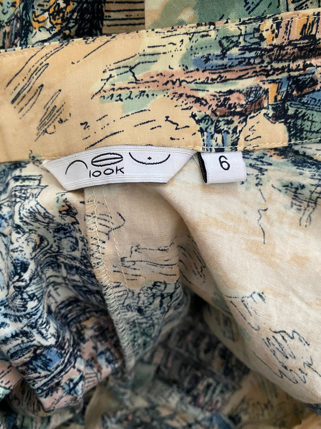 Étiquette intérieure New Look – logo années 90/2000 confirmant l'authenticité vintage de la pièce