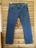 Jean vintage Levi's 501 indigo délavé – vue de face globale sur cintre